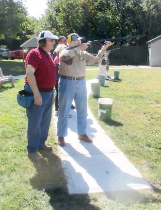 Ed Bailey, 84, of Greeenwood Lake, shoots Trap with Ranger Officer and Warwick Town Councilman Floyd DeAngelo assisting.