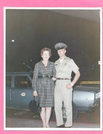 Daniel H. Burrows with his mother at the airport