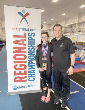 Allison Torres trains at Kennett’s Gymnastics in Goshen under Coach John Smales.