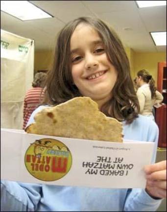 Children make matzah at Chabad's Model Matza Bakery Children make matzah at Chabad's Model Matza Bakery