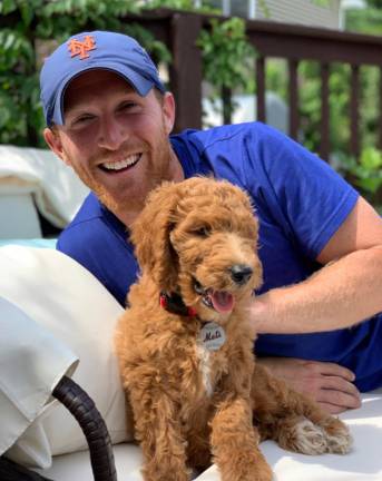 Dan Prial and his dog Shea.