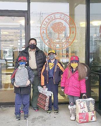 Goshen Cub Scout Pack 62 completed a community service project to donate to the seniors at Valley View Nursing Home, who are quarantined. They requested hard candies and word search books with pens to keep them occupied. Congratulations Wolves on an amazing job act of service. Photo provided by Dee Arguinzoni.