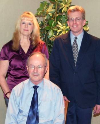 William Sammis to be new Crystal Run director Seated: Outgoing Crystal Run Village Executive Director Jim Lawler. Standing: Crystal Run Village Board of Directors President Susan Kennedy and Bill Sammis, executive director-elect.