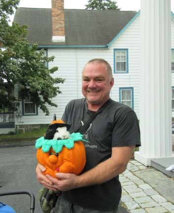 A blessing for Princess Buttercup, and other bright creatures Princess Buttercup, a therapy rabbit all decked out for Halloween, is held by owner Tommy Meyers (Photo by Ginny Privitar)