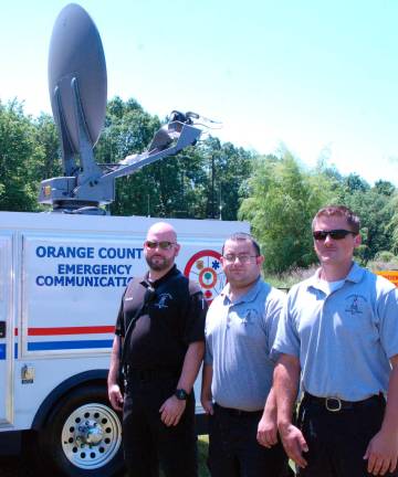 Members of the Orange County Incident Dispatch Team (from left): Commander Gregory Schmid with dispatchers Tom Marchiano and Wayne Stansfield. The team is part of the county's Division of Emergency Communications (Photo by Ed Bailey)