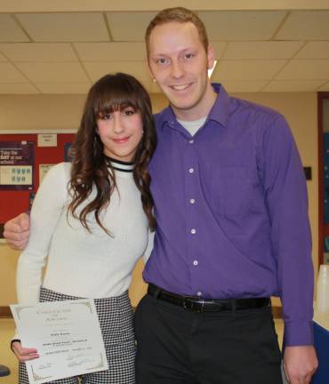 Goshen High School students honored as Goshen Greats Katie Karen with Jason Miedema