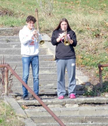 Buglers Sameer El-Rifai and Sarah Milyko