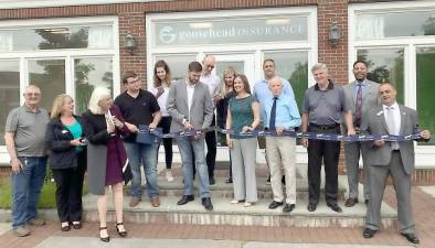 On Thursday, June 3, ambassadors from the Goshen Chamber of Commerce welcomed Goosehead Insurance to the Goshen community with a ribbon-cutting. Zach Schiller is the lead agent at Goosehead Insurance, which is situated in downtown Goshen on the first floor of the Flatiron building. Photo provided by the Goshen Chamber of Commerce/Regina Clark.