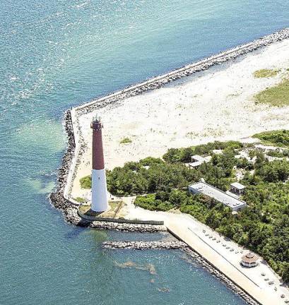 Barnegat Light. Dead, frozen whale buried on NJ beach; removal was too hard The whale had been located just off the rock jetty of the Barnegat Inlet at Barnegat Light State Park, where one of the Jersey Shore’s iconic lighthouses is located. Source: nj.gov