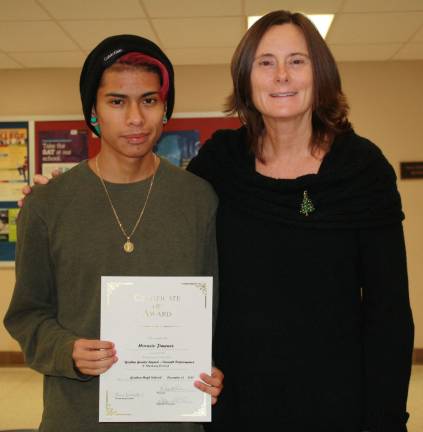 Goshen High School students honored as Goshen Greats Horacio Jimenez with Laura Dubatowka