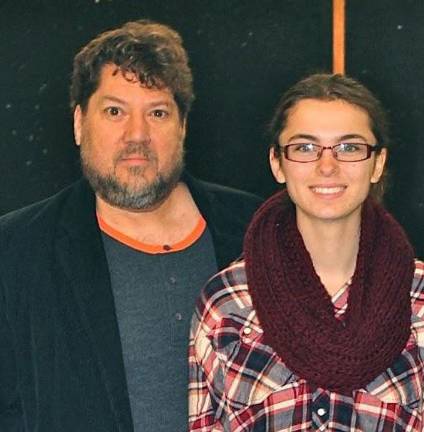 High school students honored as 'Goshen Greats' Alyssa Henderson with art teacher Christopher Tucci