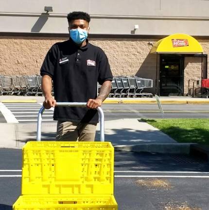 Chester. Essential worker: Anthony Gorham at ShopRite Anthony Gorham, a member of the ShopRite “Shop from Home” crew, at work in Chester. Photo by Ginny Privitar.
