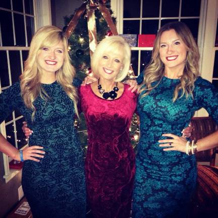 Mommy & Me Contest The Dethmers Ladies of Warwick Mother Janine Dethmers poses with her two daugther look alikes Allison Dethmers and Heather Dethmers on Christmas Eve 2013.