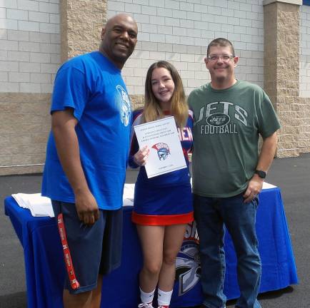 From left: Coach Gus Lawson, Samantha Brown, and Greg Brown