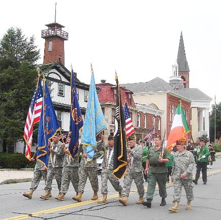 American Legion Post #377 and Veterans of Foreign War Post #1708 combined color guard were led by Cammander Ray Quattrini. Photos by Geri Corey.