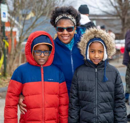 The Lewis family of Monroe bundled up to wait for Santa and Mrs. Claus arrival at Museum Village in Monroe.