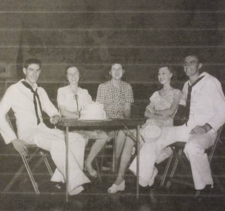 Chester LeBaron, on the far left, with some friends in a newspaper photo