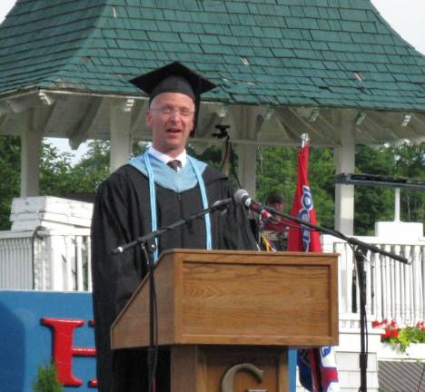 Goshen's Class of 2014 Principal Kurtis Kotes addresses the assembly.