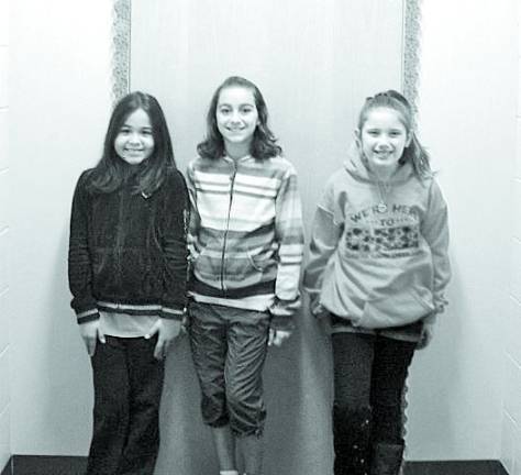 Chester musicians excel at All County Chorus Brianna Ramos, Corrine Randazzo, and Anya Quinn.