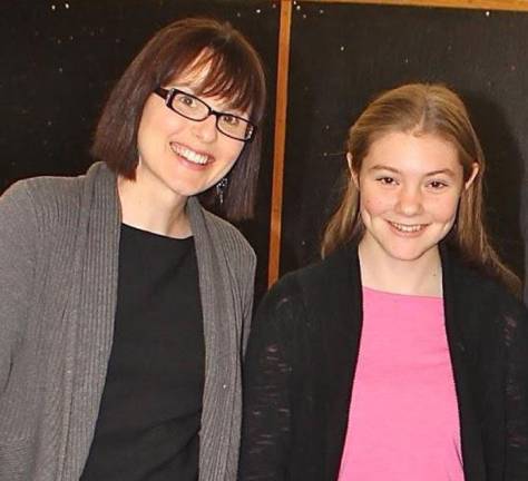 High school students honored as 'Goshen Greats' Katelyn Zirilli with social studies teacher Marie Jane Panzer
