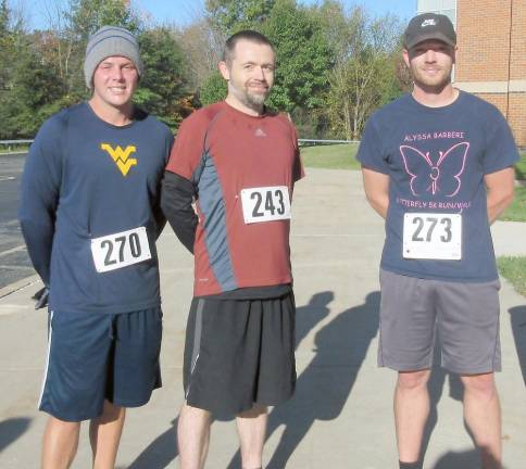 The top three overall finishers, from left: Ryan Stover, second place; Evan Morgan, first place; and Joe Clarke, third place.