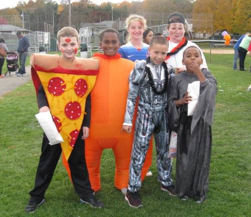 Chester celebrates the haunting season A colorful group, in front: Rory Farrell, 9; Andre Jenkins,9; Brandon Cruz, 9; and Brandon Jenkins; in back: Caroline Farrell, 11, and Daniel Gorman, 9 (Photo by Ginny Privitar)