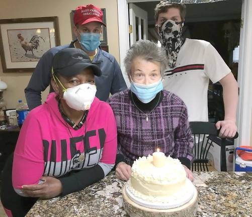 Celebrating birthdays in quarantine In the back are Scott Corneby and his son Brendan Corneby while in front are Pauline Bookman and the Matriarch and Birthday girl, Shay Corneby.