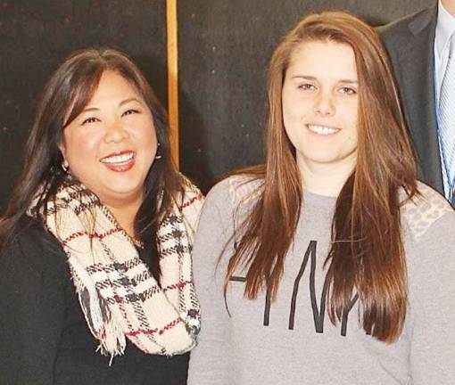 High school students honored as 'Goshen Greats' Brittany Connelly with science teacher Patricia Gaer