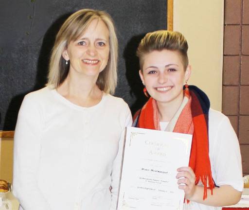 The Goshen Greats Honor Montmarquet with foreign language teacher Claire Polanis