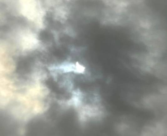 Clouds took hold of the sky as the eclipse waned.