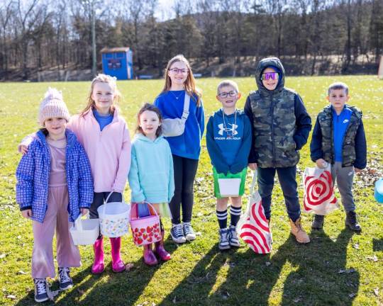 (L -R) Emily Doellinger of Chester, Leighla and Harper Jordan of Monroe, Kate Doellinger of Chester, Charlie Doellinger of Chester, and Joseph and Lucas Schatz of Chester anxiously waiting to collect Easter eggs at the PBA annual Easter Egg Hunt at Chester Commons Park. Photo by Sammie Finch