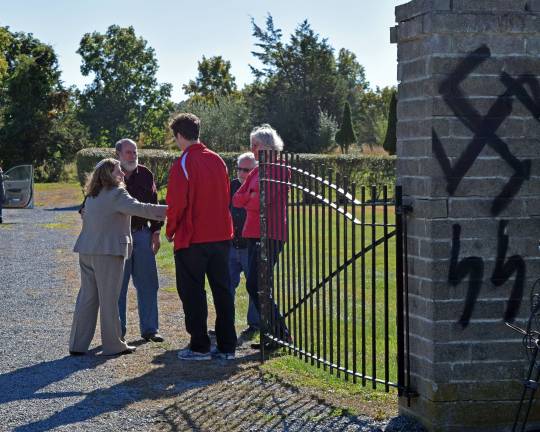 Jewish cemetery desecrated with anti-Semitic graffiti days before Yom Kippur Rabbi Rebecca Shinder speaks about the anti-Semitic vandalism with those who visit the cemetery.