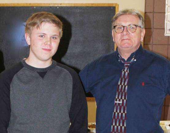 The Goshen Greats Casey McCarty with English teacher Marlin Maduras