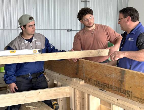 Heritage Trail is the venue for foundation’s 5K run Students at Orange-Ulster BOCES in Goshen work on the modular units for the village for veterans with Corey Miller, Director of Construction Education. Photo provided.