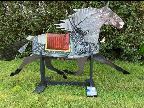 Artist Pat MacDonald/Goshen Art League. The trotter is located at Goshen Historic Track.