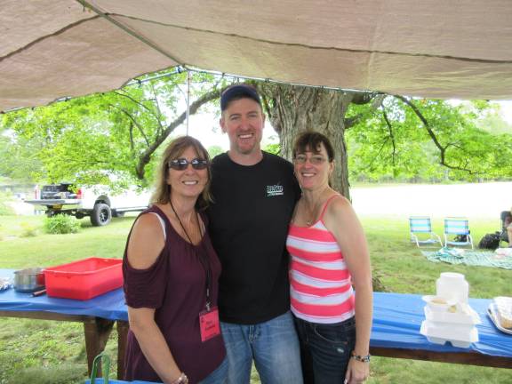 A great day for the Bull family Cheri Cardone, son B.J., and daughter Jamie LeFebvre prepared a delicious meal for all (Photo by Ginny Privitar)