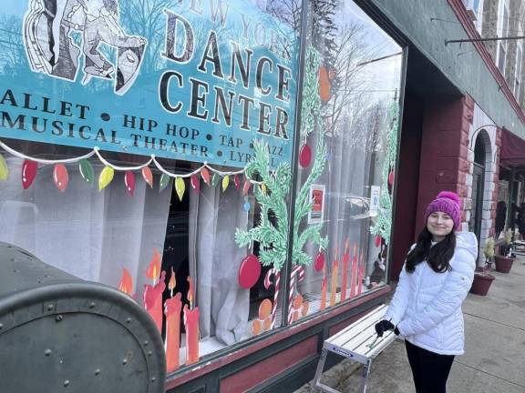 Chester Academy students decorate local shops with holiday scenes