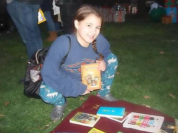 Happy with her book selection was Alexis Sofia, a sixth-grade student at C.J. Hooker Middle School.