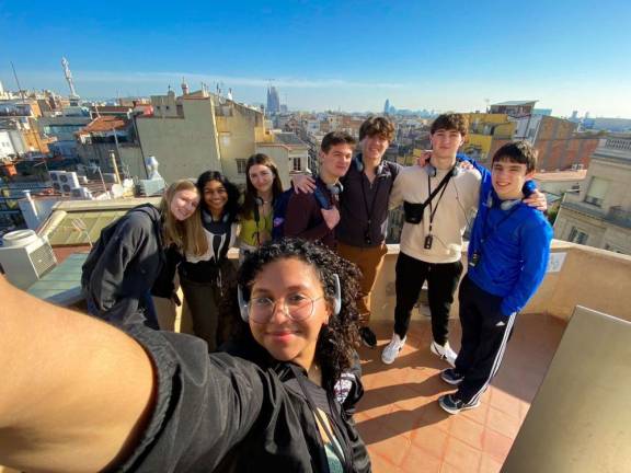 Students on the roof of La Pedrera-Casa Mila, a home designed by famous Spanish architect Gaudi. Left to right: seniors Ana Loter, Eesha Ramanathan, Cora Pahucki and juniors Michael Hulse, Judah Gordon, Nick Gati and Michael Lumbardy. Senior Kiara Paulino is in front taking the photo.