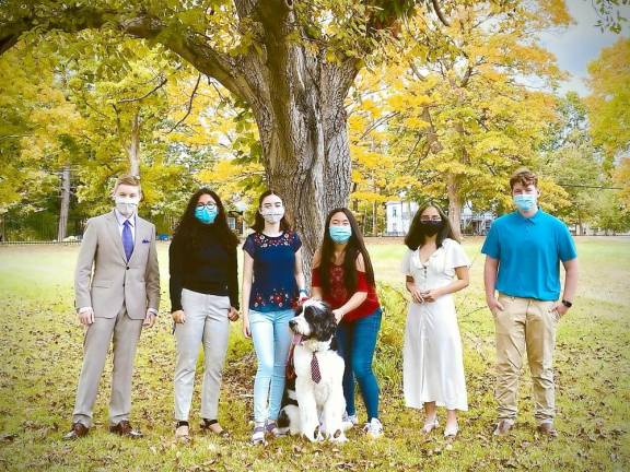 The dog in the photo with the stylish tie is Pudsey; he is tutor Gabriel Kaufman's cherished pet. Human tutors, left to right are: Gabriel Kaufman; Kiara Paulino; Hannah Fruhling; Jolina Dong; Damaris Rodriguez; and Jack Moran. Photos provided by Teen Tutors of Goshen.