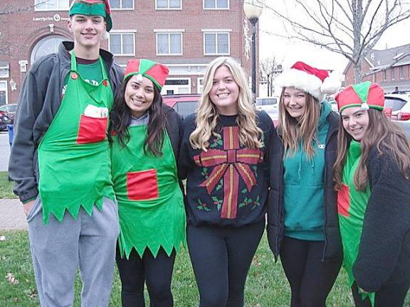 A group “elves” from the Goshen High School Leo Club helped younger children with games. From
