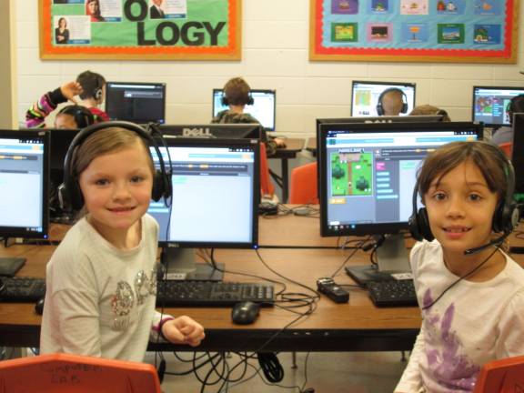 Coding is 'like playing,' young programers say Two coders of the future: Cali Vento and Olivia Zottola (Photo by Ginny Privitar)