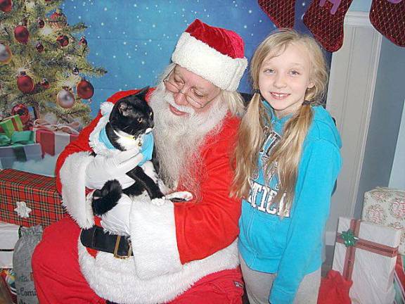 Eight-year-old Bella Wicks from Middletown says of Oreo, her eight-month-old kitten, He’s purr-fect!