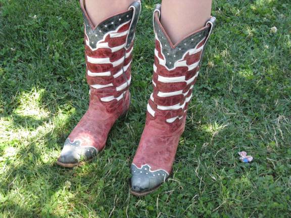 Great American Weekend brings on the crowds Corinne Redner’s patriotic boots.