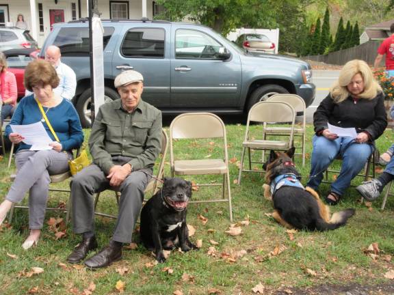 A blessing for Princess Buttercup, and other bright creatures Henry (left), an English Stafforshire terrier, with owners Paula and Harvey Shames of Sugar Loaf (Photo by Ginny Privitar)