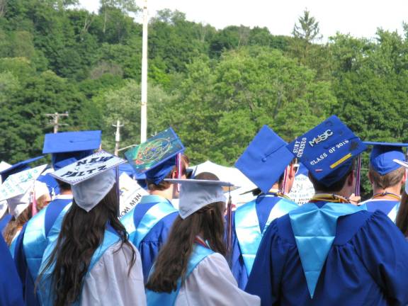 Goshen's Class of 2014 Lots of decorated caps.