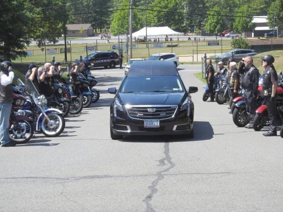 Veteran Alex Gamma, who died at 80 on July 12, is saluted at his funeral by 21 veteran motorcyclists.