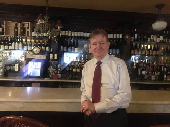 Toasting the past — and what’s to come Tommy Burke at Papillon on East 54th Street. Photo credit is Papillon Bistro & Bar.