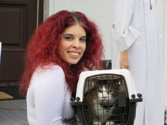 A blessing for Princess Buttercup, and other bright creatures Melissa Somma and her cat, Sibyl, a greeter for Somma’s Lightclub Curiosity Shop in Sugar Loaf (Photo by Ginny Privitar)