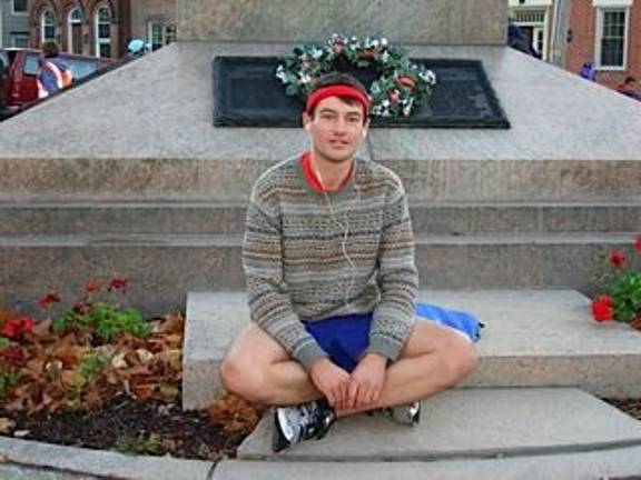 Runners rack up miles at first-ever marathon Taylor Knoblock, 25, Goshen, relaxing before the start of his first official marathon. Taylor, who won the 10K at Great American Weekend, came in sixth on Sunday. (Photo by Geri Corey)